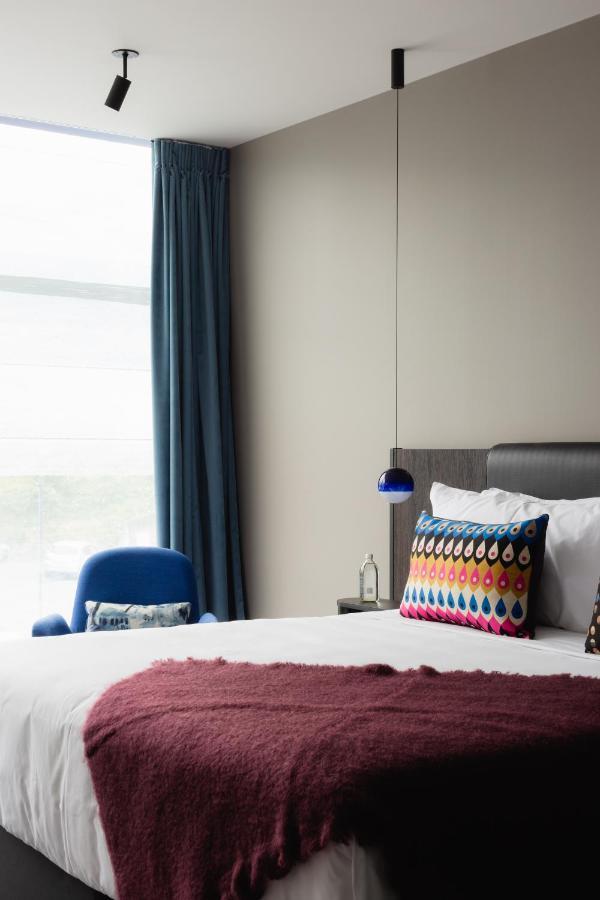 Ebb-ดะนีดิน ภายนอก รูปภาพ A bedroom at the hotel
